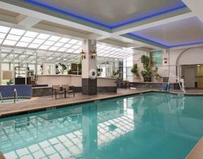 Relaxing indoor pool area at the Embassy Suites by Hilton San Francisco Airport Waterfront.