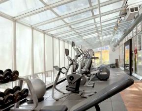 Bright fitness center at the Embassy Suites by Hilton San Francisco Airport Waterfront.