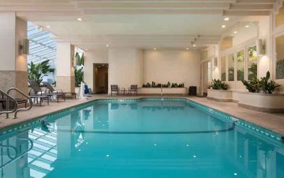 Relaxing indoor pool at the Embassy Suites by Hilton San Francisco Airport.