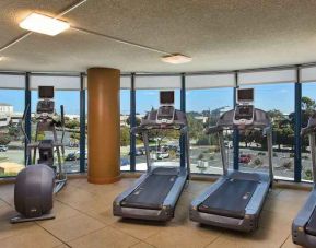 Fitness center with treadmills at the Embassy Suites by Hilton San Francisco Airport.