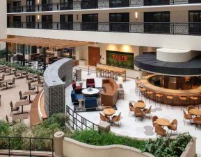 Spacious and comfortable hotel area perfect as workspace at the Embassy Suites by Hilton San Francisco Airport.