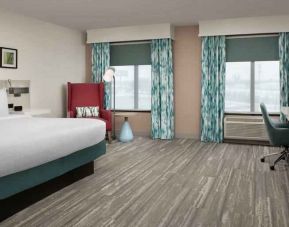 Spacious king guestroom with working station at the Hilton Garden Inn Dallas/Duncanville.