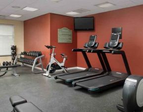 Fitness center with treadmills and weights at the Hilton Garden Inn Dallas/Duncanville.