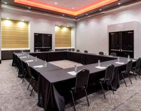 Meeting room with square table at the Hilton Garden Inn Hays.