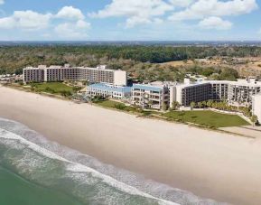 Stunning aerial view of the beach at the DoubleTree by Hilton Myrtle Beach.