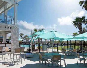 Beautiful outdoor patio perfect as workspace at the DoubleTree by Hilton Myrtle Beach.