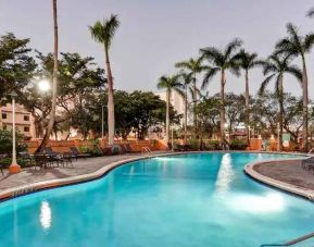 Outdoor swimming pool at the Embassy Suites by Hilton Miami - International Airport.