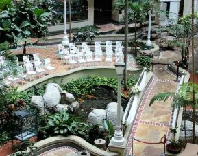 Beautiful outdoor patio with garden at the Embassy Suites by Hilton Miami - International Airport.