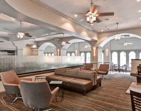 Workspace in an elegant dining area at the Embassy Suites by Hilton Miami - International Airport.