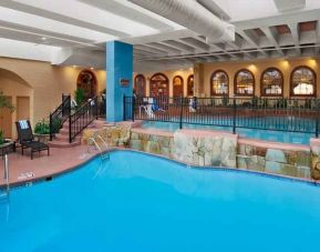 Relaxing indoor pool area at the Embassy Suites by Hilton Kansas City Plaza.