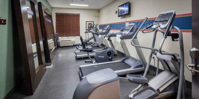 Well-equipped fitness center at Hampton Inn San Francisco Airport.