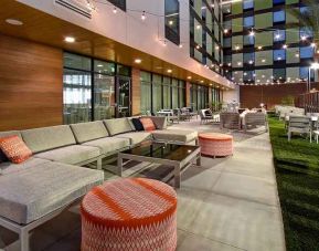 spacious outdoor lounge and coworking space at Hampton Inn & Suites Las Vegas Convention Center.
