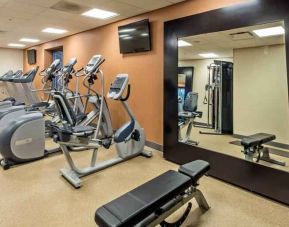 Fitness center with treadmills and mirror at the Hilton Garden Inn Minneapolis Airport Mall of America.