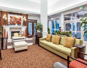 Workspace with lounges in a hotel lobby at the Hilton Garden Inn Minneapolis Airport Mall of America.