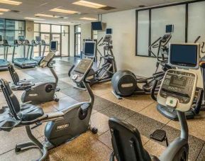 Fitness center with treadmills and machines at the Hilton Salt Lake City Center.