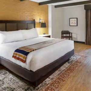 Spacious king bed with work station at The Modern Honolulu.
