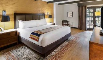 Spacious king bed with work station at The Modern Honolulu.
