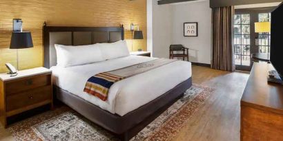 Spacious king bed with work station at The Modern Honolulu.