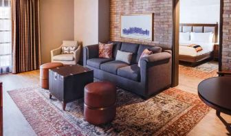 Stylish living room in a king suite at the Estancia del Norte San Antonio, Tapestry Collection.