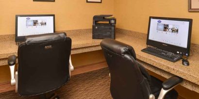 Dedicated business center with printer, computers, and internet at Hampton Inn & Suites Pueblo-Southgate.