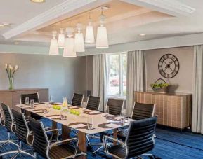 Small meeting room with table and chairs at the Hilton Wilmington-Christiana.