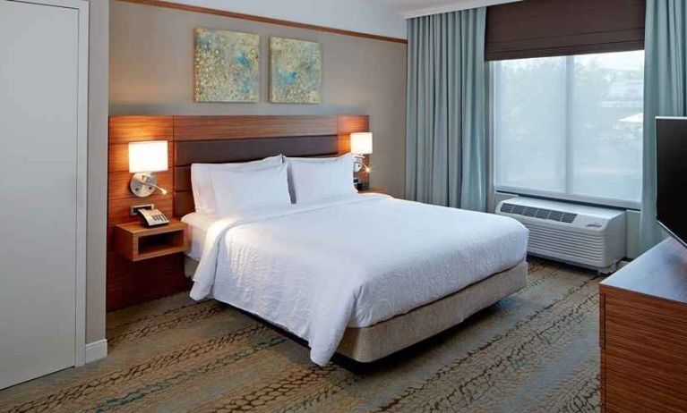 Luxury king room with TV and work area at Hilton Garden Inn Boston/Marlborough.