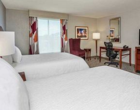 Double queen room with working station at the Hilton Garden Inn Blacksburg University.
