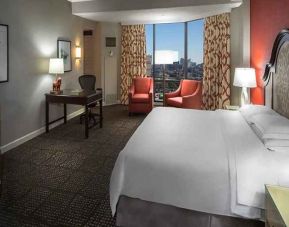 luxurious delux king with TV and work area at Hilton Anatole.