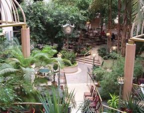 Beautiful outdoor patio with garden at the Embassy Suites by Hilton Birmingham.