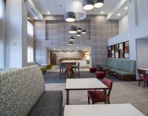 Spacious and comfortable worskpace in a hotel lobby at the Hampton Inn & Suites North Attleboro.