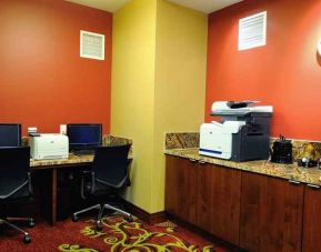 dedicated business center with computers, internet, and printers at Embassy Suites by Hilton Houston Downtown.