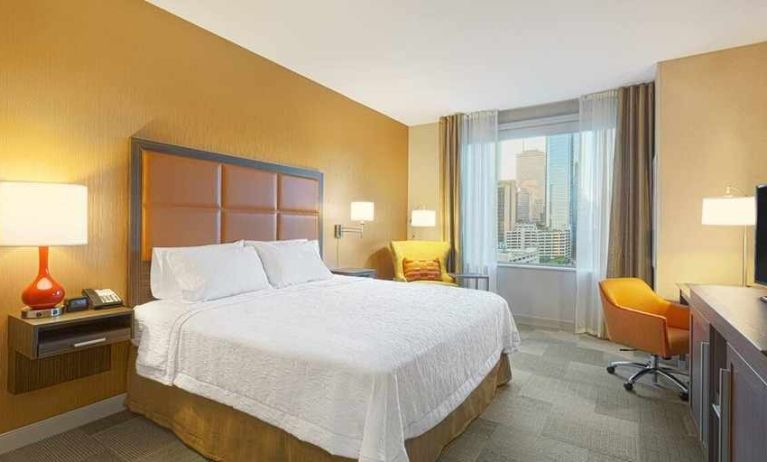 Luxurious delux king room work area and natural light at Hampton Inn Houston Downtown.