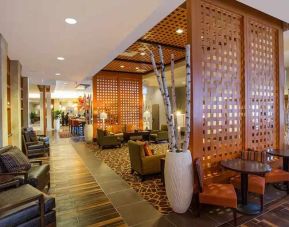 Comfortable lobby lounge area ideal for coworking at Hampton Inn Houston Downtown.