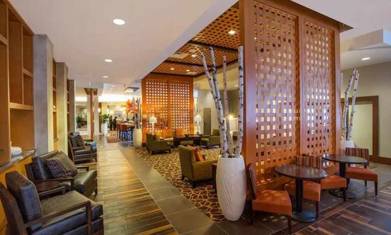 Comfortable lobby lounge area ideal for coworking at Hampton Inn Houston Downtown.