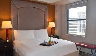 Comfortable king room at The Sam Houston, Curio Collection by Hilton.