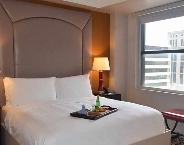 comfortable king room at The Sam Houston, Curio Collection by Hilton.