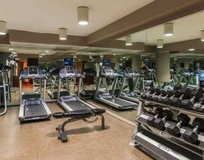 well-equipped fitness center at The Sam Houston, Curio Collection by Hilton.