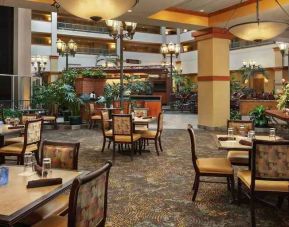 Restaurant area perfect as workspace at the Embassy Suites by Hilton Charleston Airport Convention Center.