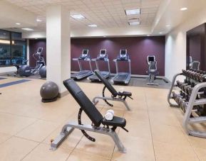 Weights and machines at the fitness center of the Embassy Suites by Hilton Nashville SE Murfreesboro.