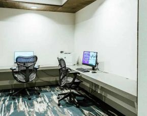 dedicated business center with PC, printer, and work desk ideal for working remotely at Hilton Garden Inn Denver Union Station.