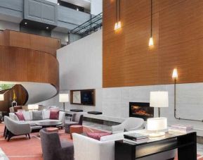 Stylish lobby workspace with sofas and chairs at the Hilton Columbus Downtown.