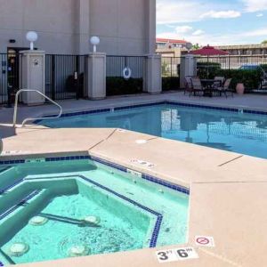 Beautiful outdoor area with two pools at the Hampton Inn Albuquerque, University-Midtown (UNM).