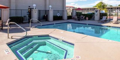 Beautiful outdoor area with two pools at the Hampton Inn Albuquerque, University-Midtown (UNM).