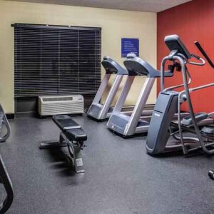 Fitness center with treadmills and machines at the Hampton Inn Albuquerque, University-Midtown (UNM).