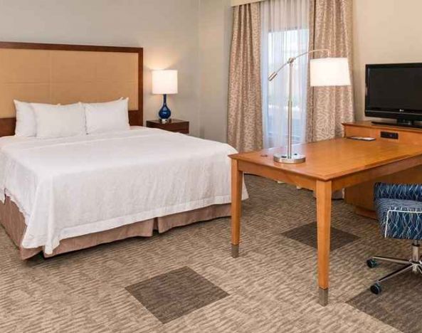 spacious delux king room with work desk ideal for working remotely at Hampton Inn & Suites Schertz.