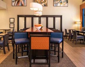 comfortable restaurant and lounge area ideal for coworking dedicated business center and workspace with PC, printer, and internet connection at Hampton Inn & Suites Schertz.