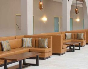 spacious lounge area ideal for coworking at Embassy Suites by Hilton Seattle North Lynnwood.