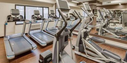 fully equipped fitness center at DoubleTree by Hilton Hotel & Suites Jersey City.