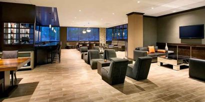 comfortable lobby and lounge area perfect as a coworking space at DoubleTree by Hilton Hotel & Suites Jersey City.