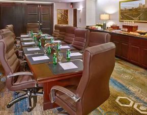 Elegant meeting room with comfortable chairs at the DoubleTree by Hilton Tulsa-Downtown.